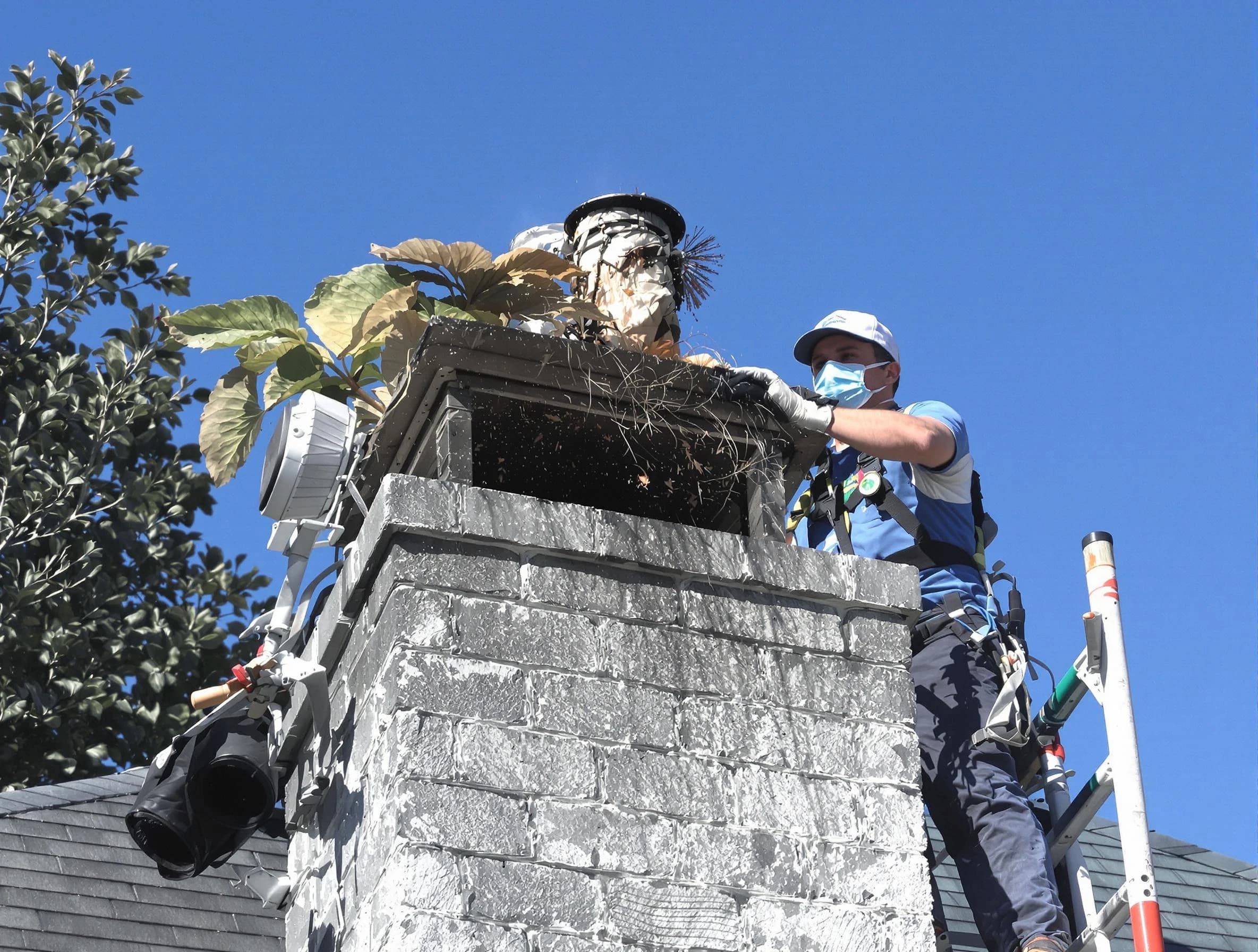 Wyncote Chimney Sweep specialist performing chimney cleaning in Wyncote, PA